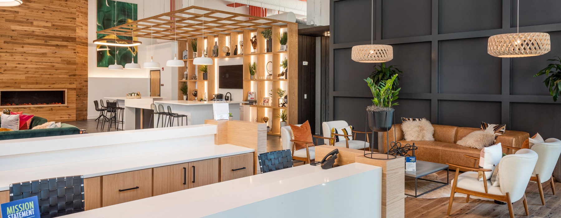 Modern apartment clubhouse with coworking spaces, lounge seating, and resident amenities at The Keswick in Chamblee, Georgia